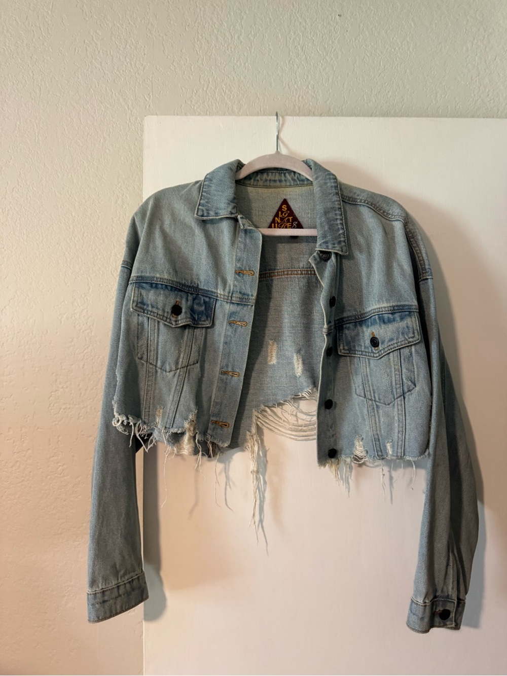 Signature Cropped Distressed Denim Jacket